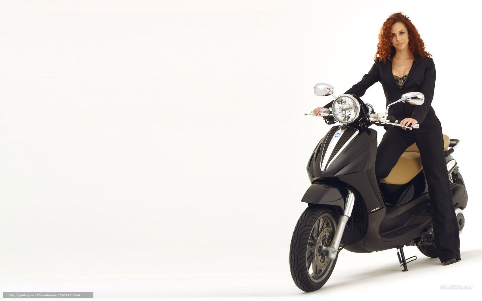 woman on black scooter