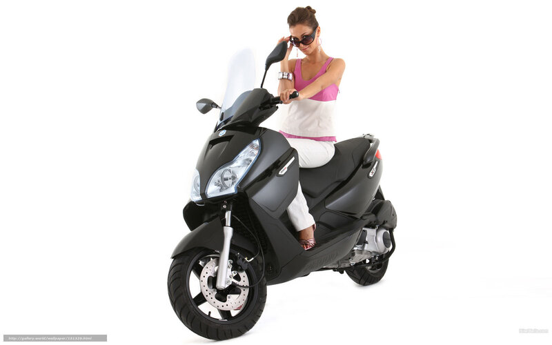 woman on black scooter