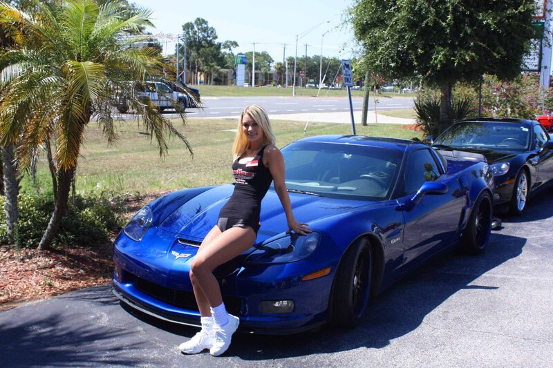 Woman on Blue Car — Bright