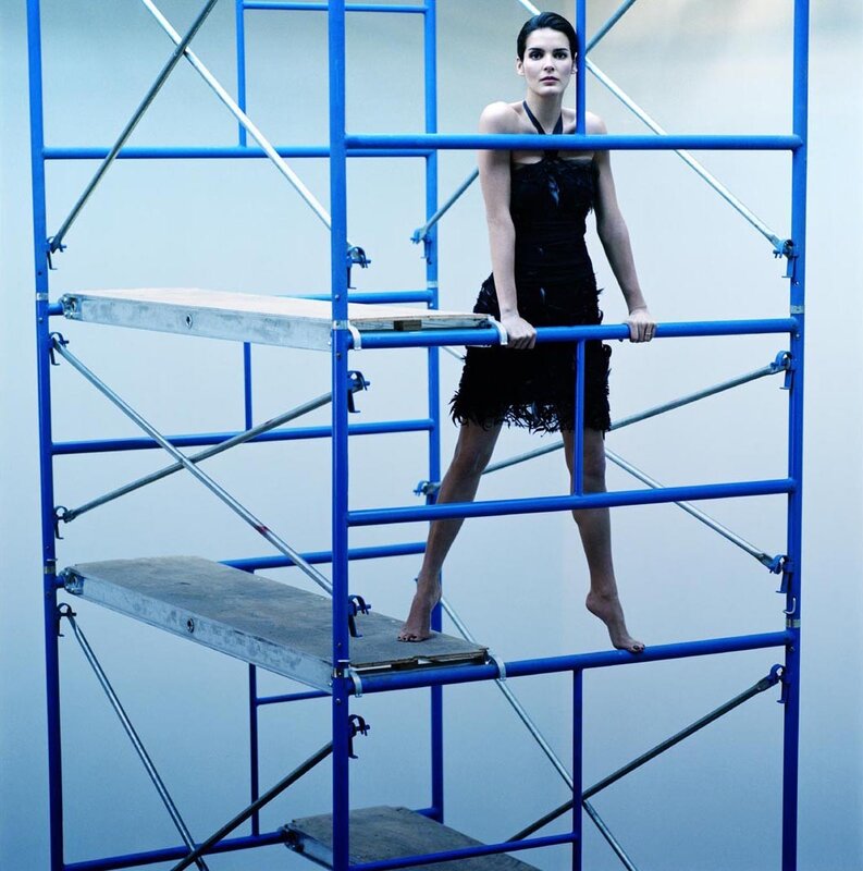 woman on blue scaffolding