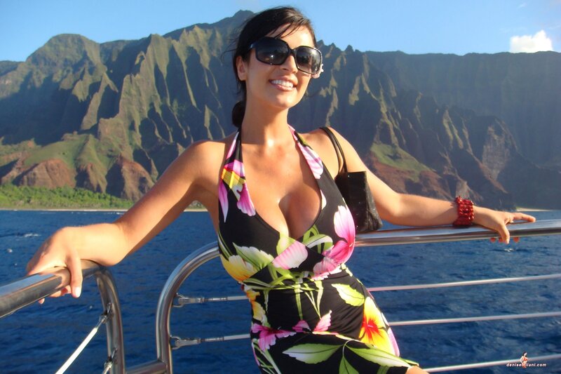 Woman on boat with mountains