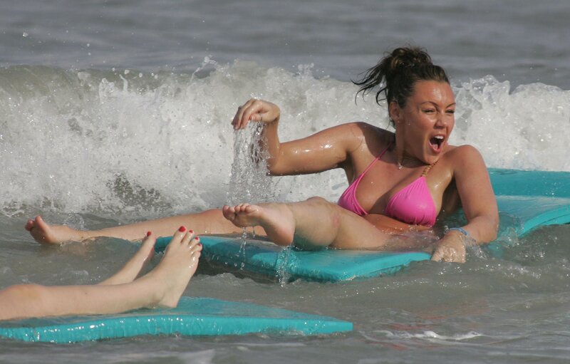 Woman on bodyboard in ocean