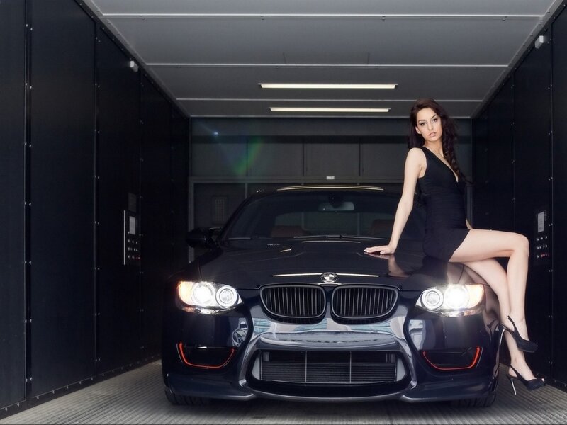 Woman on Car Hood — Elevator