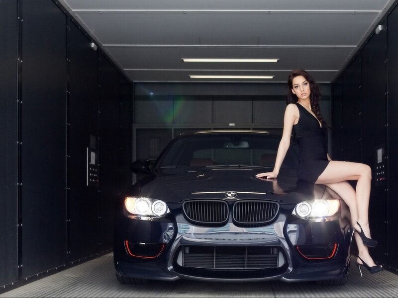 Woman on Car Hood — Photograph