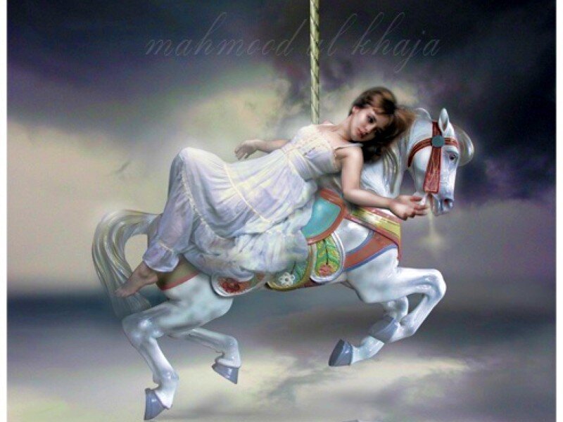 woman on carousel horse