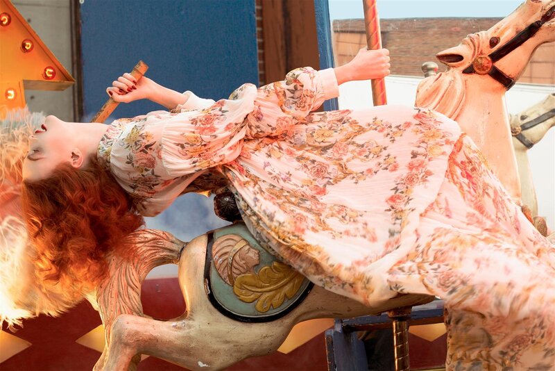 Woman on Carousel Horse — Pink, Dramatic