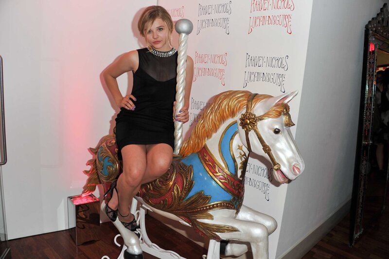 Woman on carousel horse
