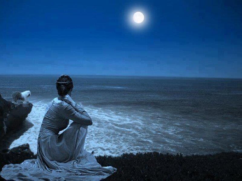 Woman on Cliff at Night — Blue