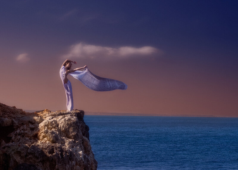 Woman on Cliff Edge — Blue, Dramatic