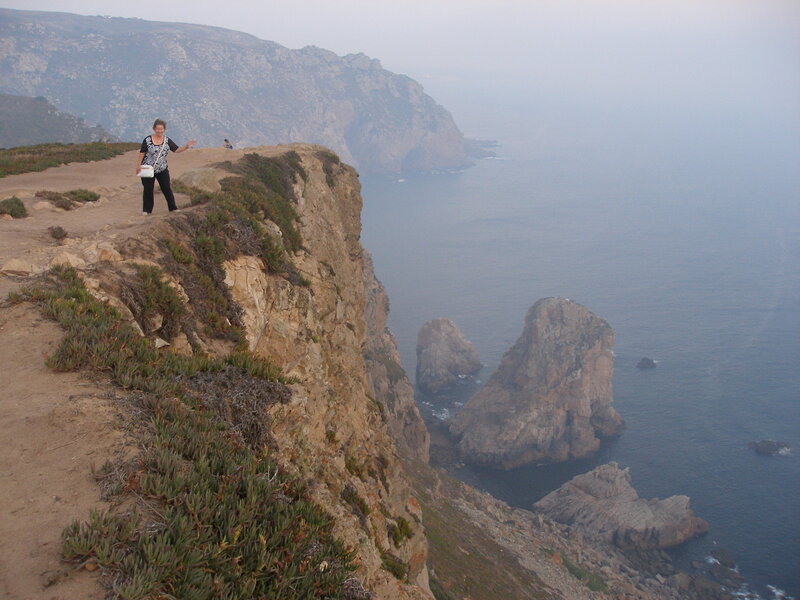 Woman on Cliff Edge — Blue