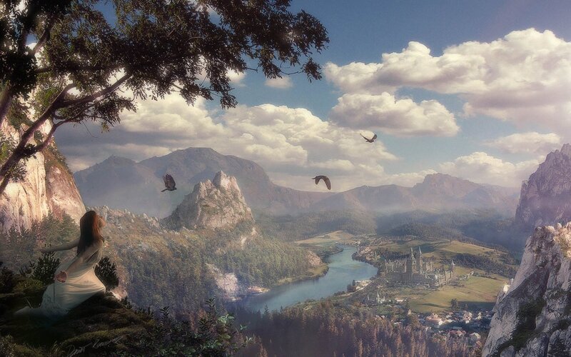 Woman on Cliff Overlooking Valley