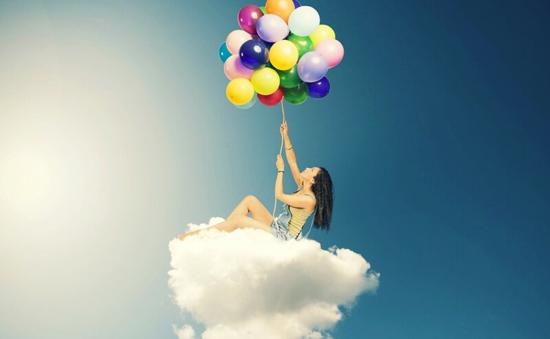 Woman on Cloud with Balloons