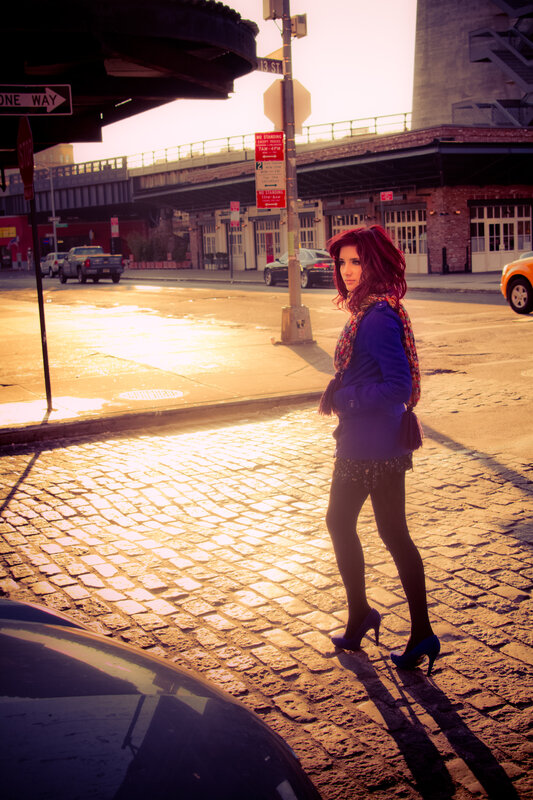 Woman on cobblestone street