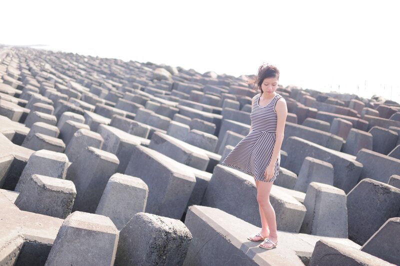 Woman on concrete blocks
