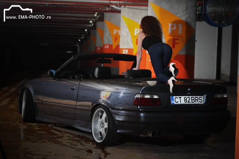 woman on convertible car