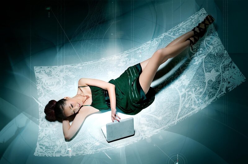 woman on digital carpet with laptop