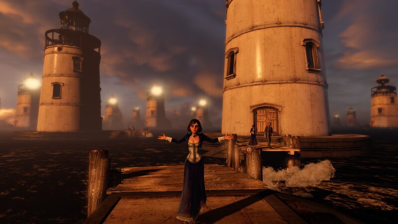 woman on dock with lighthouses