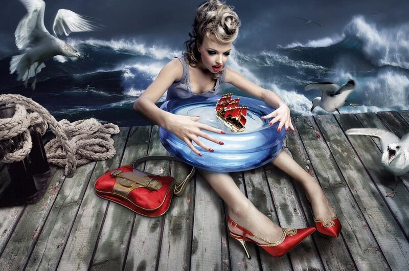 woman on dock with toy ship