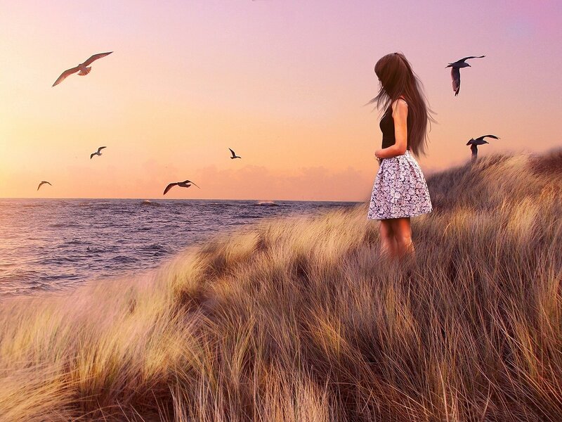 Woman on Dune at Sunset