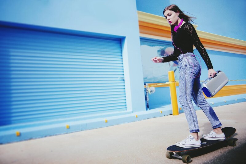 Woman on electric skateboard