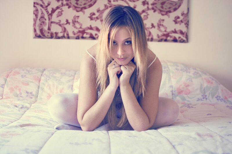 woman on floral bed
