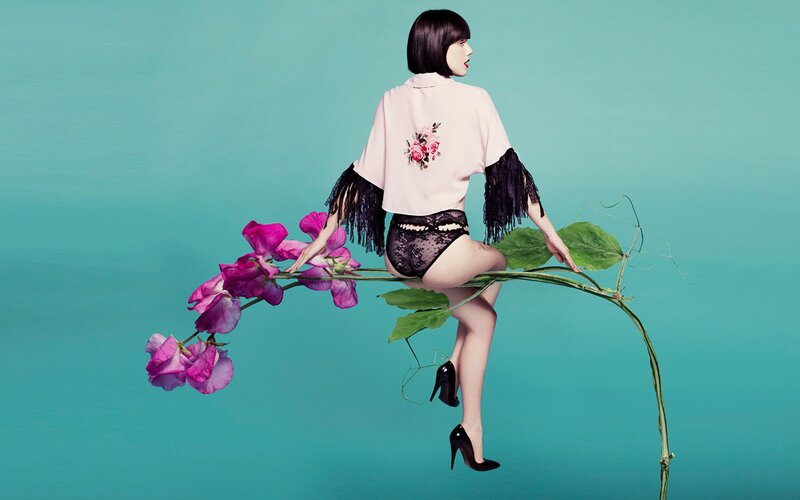 woman on floral branch