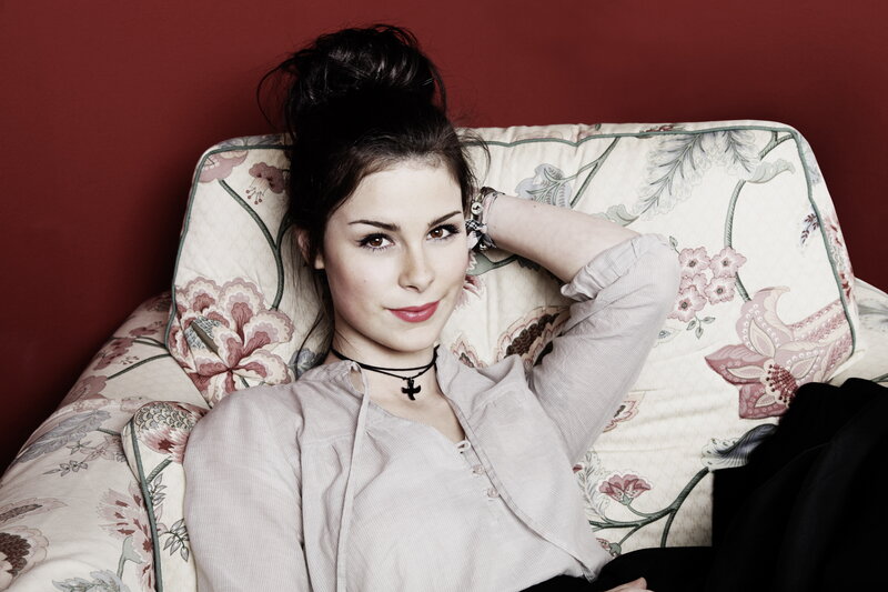 woman on floral couch