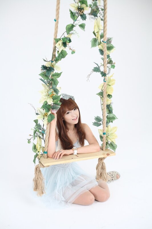 woman on floral swing