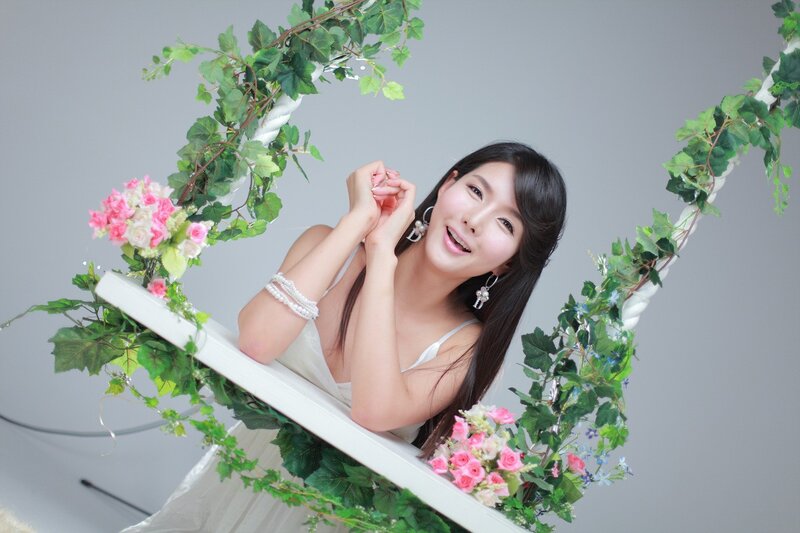 woman on floral swing