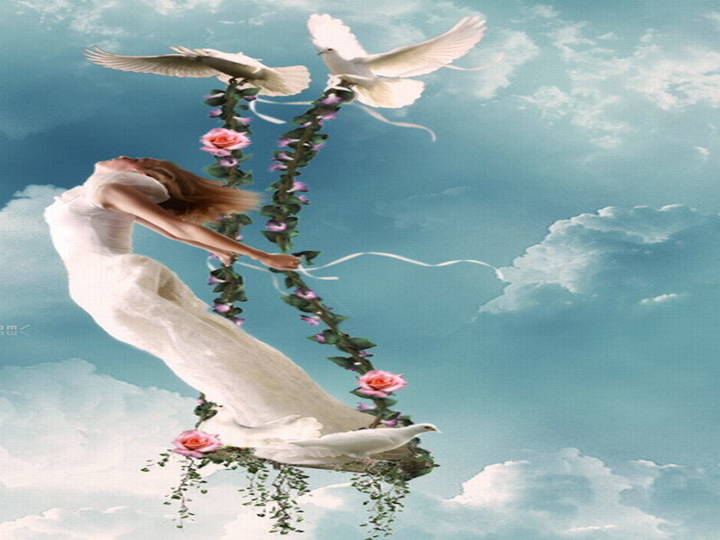 woman on floral swing in sky