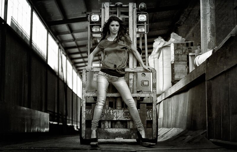 woman on forklift in warehouse