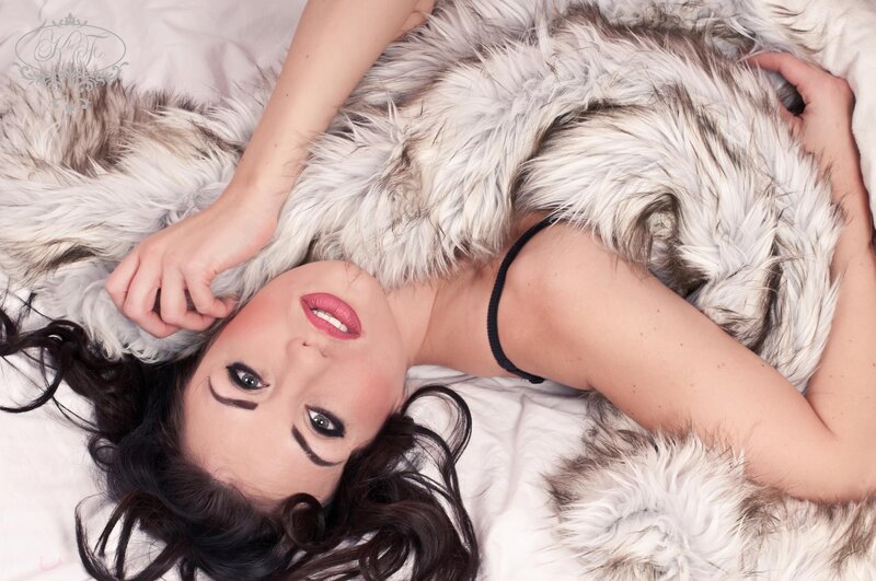 woman on fur blanket