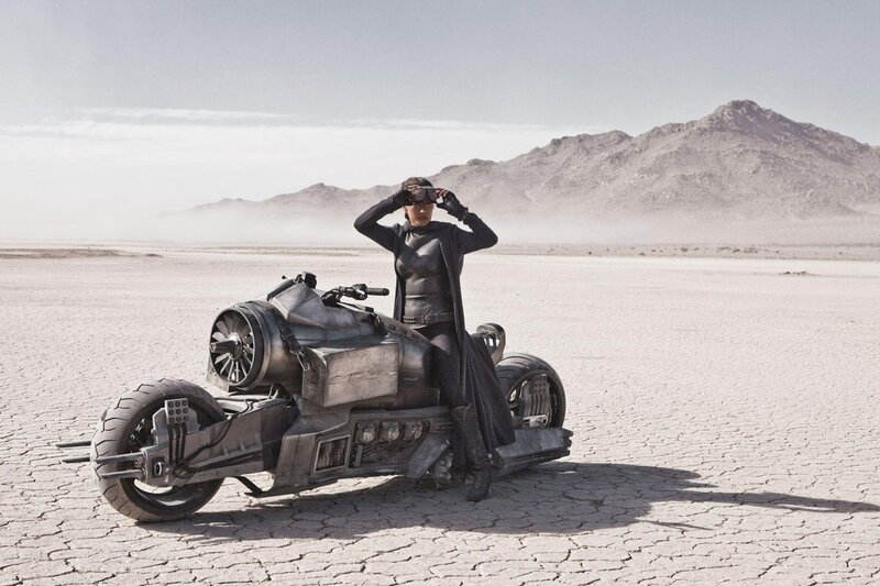 woman on futuristic motorcycle
