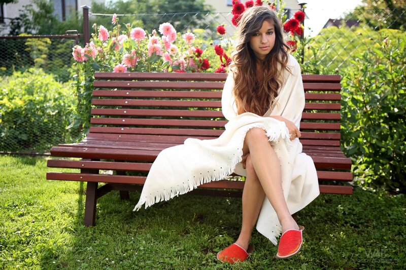Woman on garden bench
