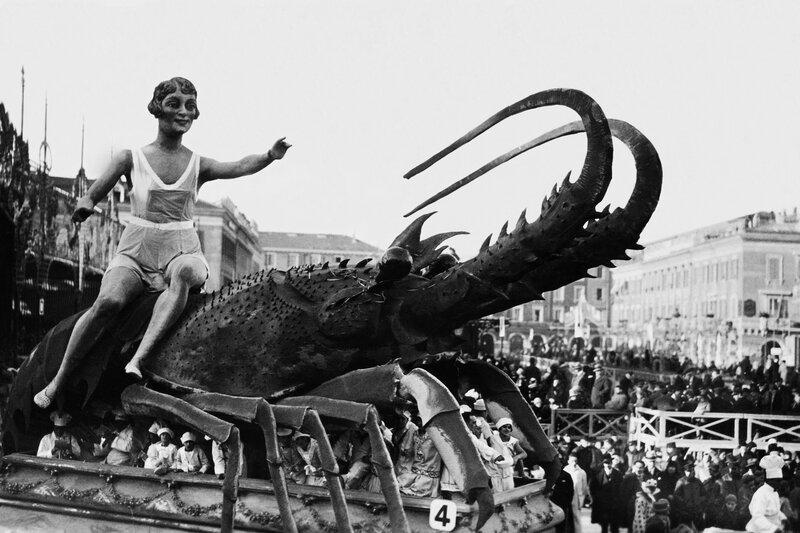 Woman on giant lobster float