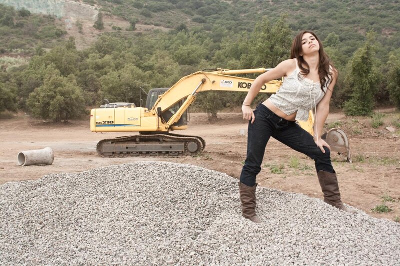 Woman on Gravel Pile