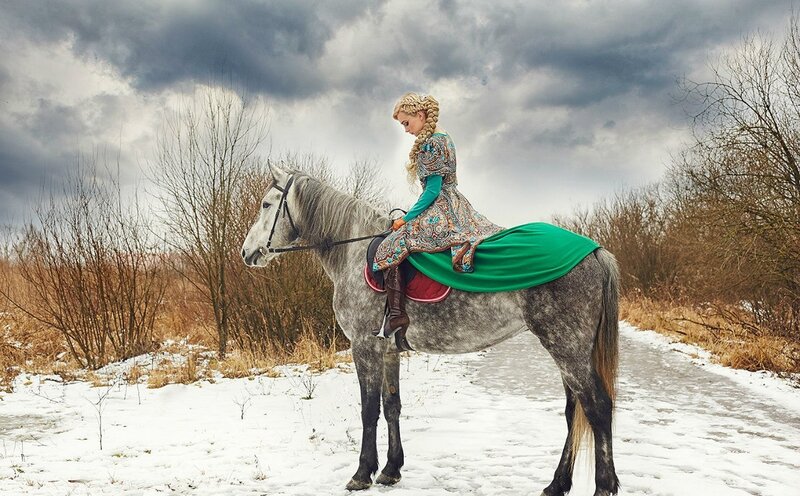 Woman on Gray Horse