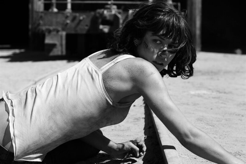 woman on ground in black and white