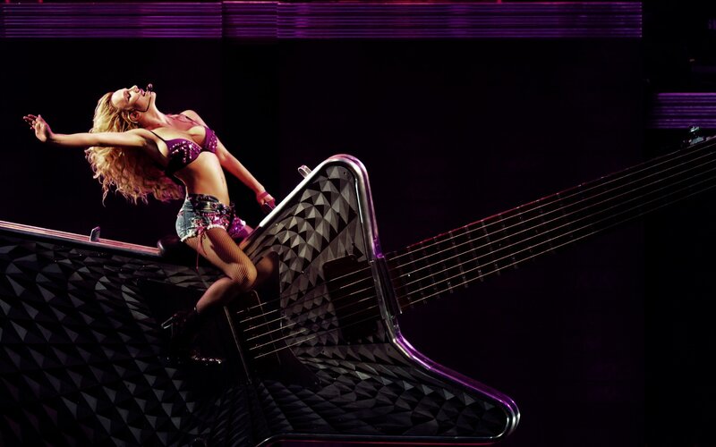 Woman on Guitar Stage