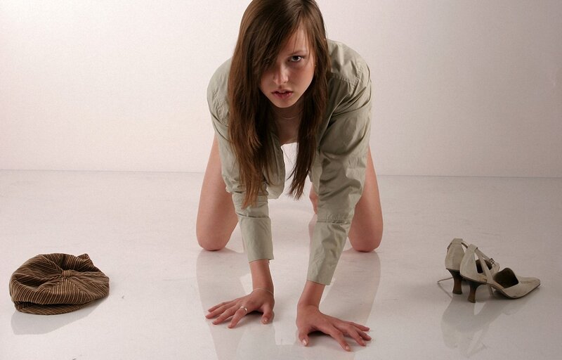 woman on hands and knees in studio