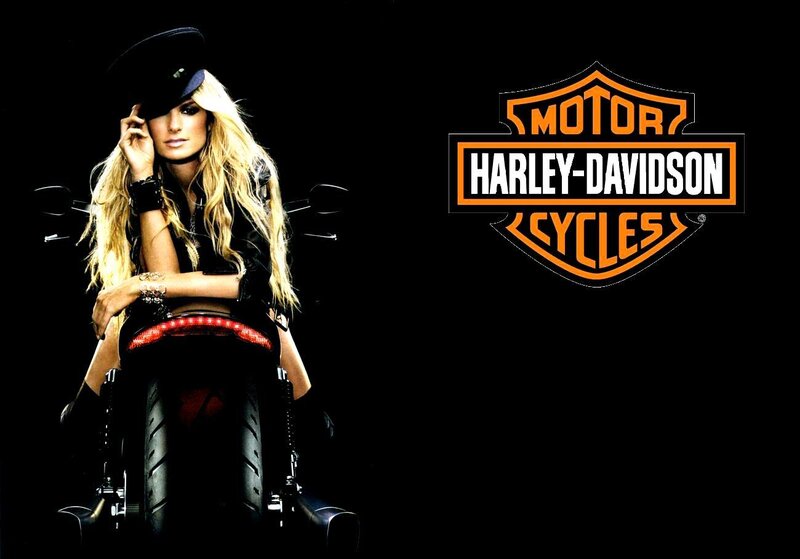 woman on harley-davidson motorcycle
