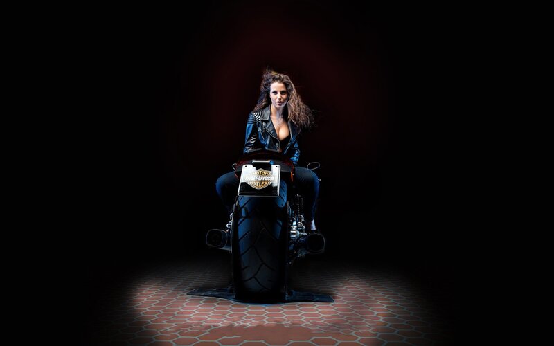 woman on harley-davidson motorcycle