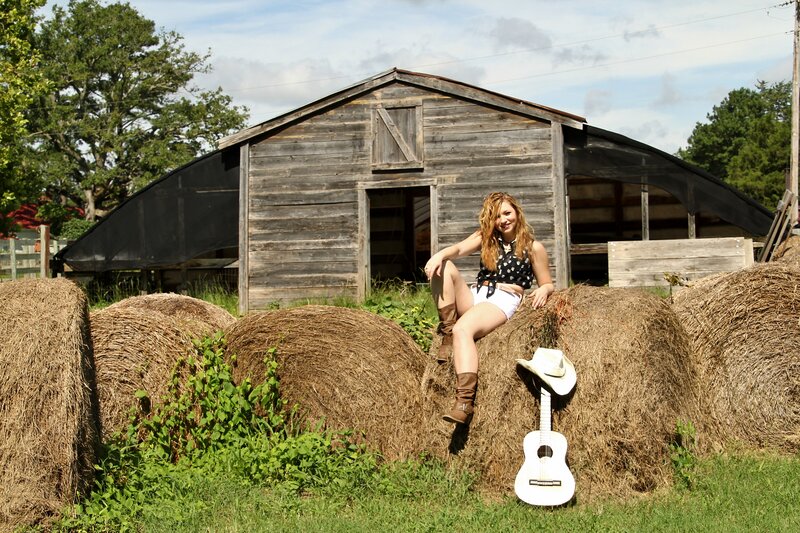 Woman on Hay Bale — Brown, Rural