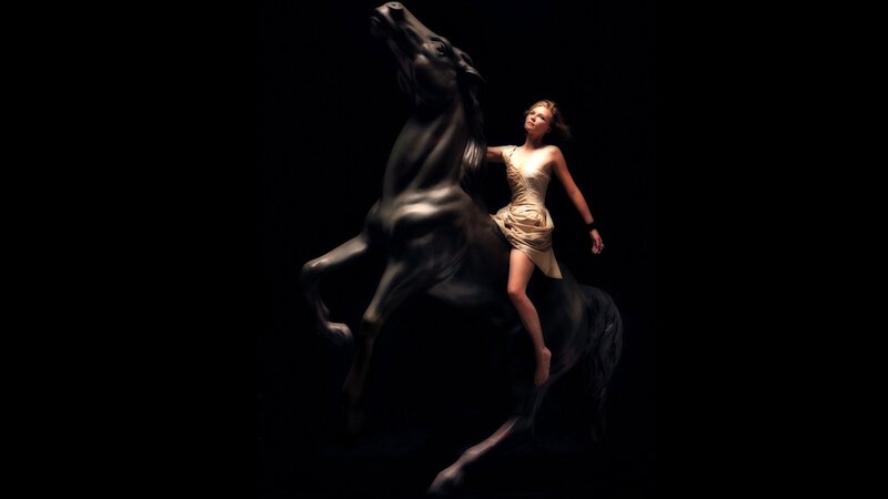 woman on horse statue