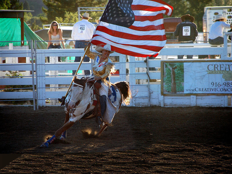 Woman on Horse with Flag — Brown