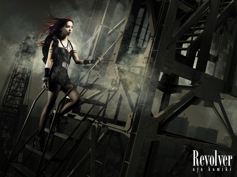 Woman on industrial staircase