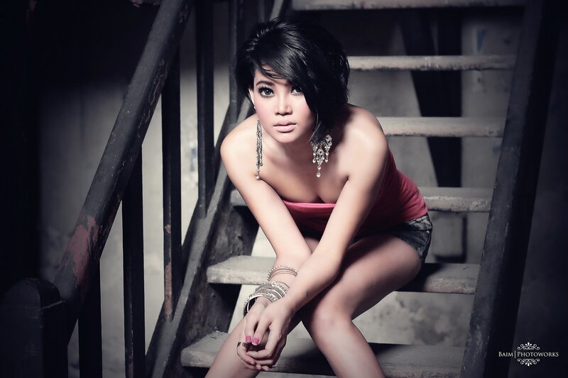 woman on industrial stairs