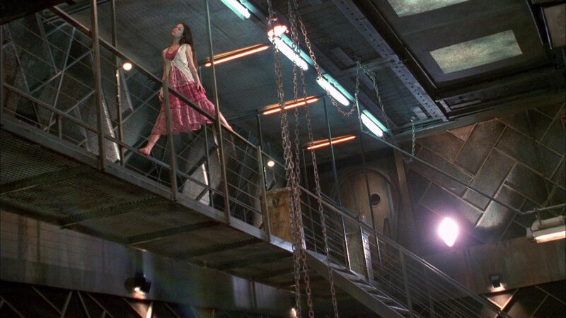 woman on industrial walkway