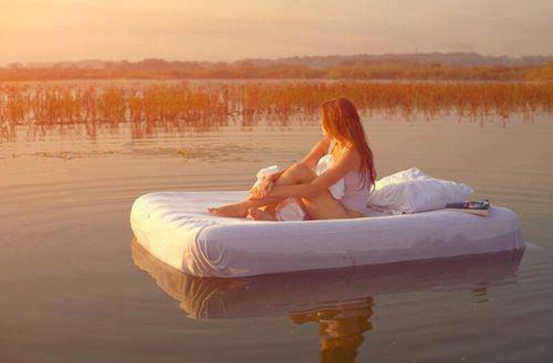 Woman on Inflatable Mattress