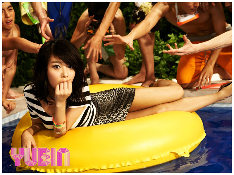 Woman on inflatable ring in pool